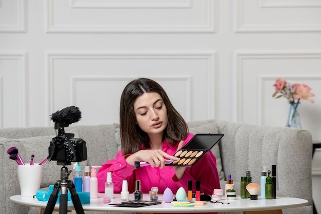 make-up-blogger-brunette-lovely-cute-young-lady-recording-blog-camera-explaining-steps